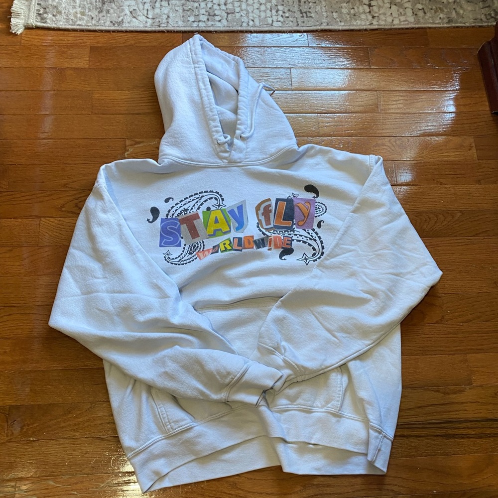white hoodie stay fly worldwide